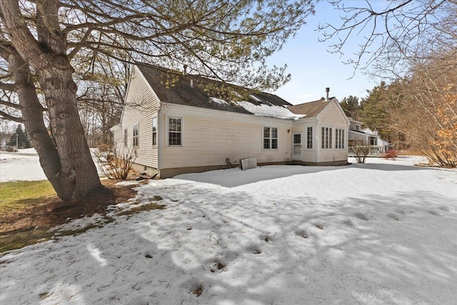 view of snow covered house