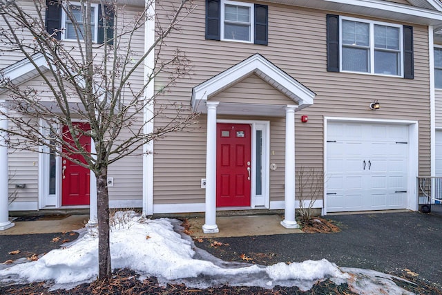 view of property with a garage