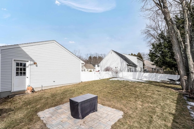 view of yard with a fenced backyard and a patio area