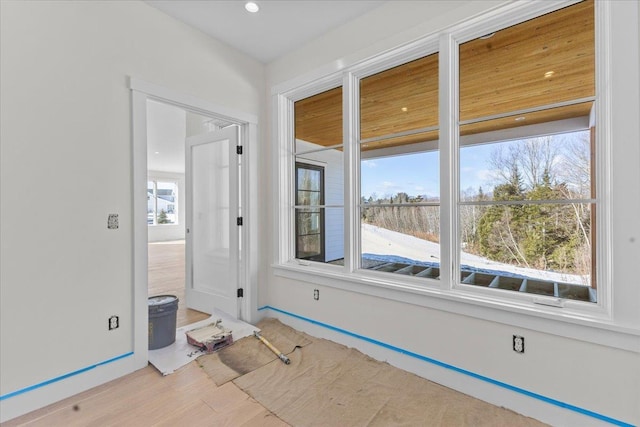 empty room with wood finished floors