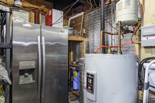 utility room with electric water heater