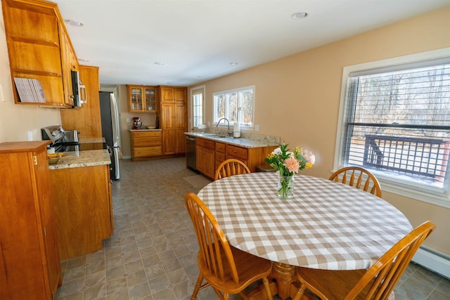 dining area with baseboard heating and recessed lighting