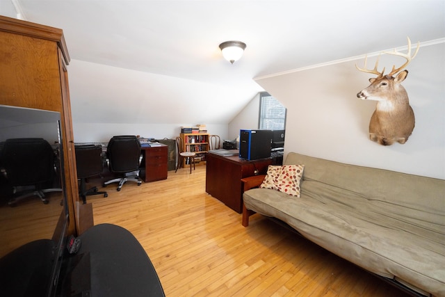 office space featuring lofted ceiling and light wood finished floors