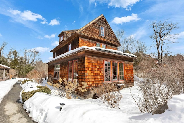 view of snow covered property