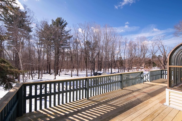 view of snow covered deck