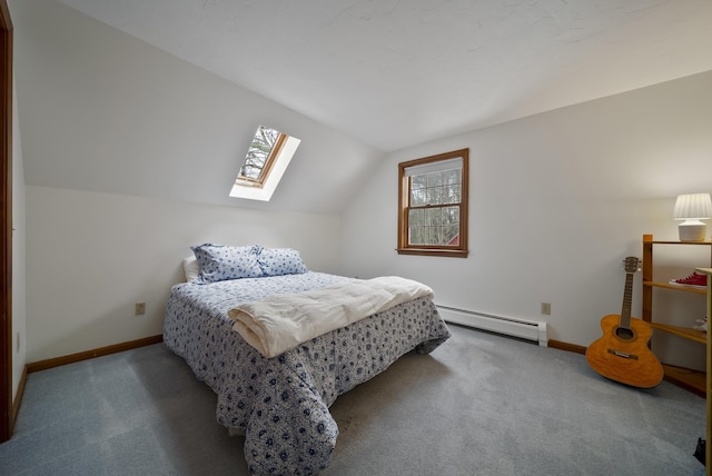 bedroom featuring a baseboard heating unit, lofted ceiling, baseboards, and carpet floors