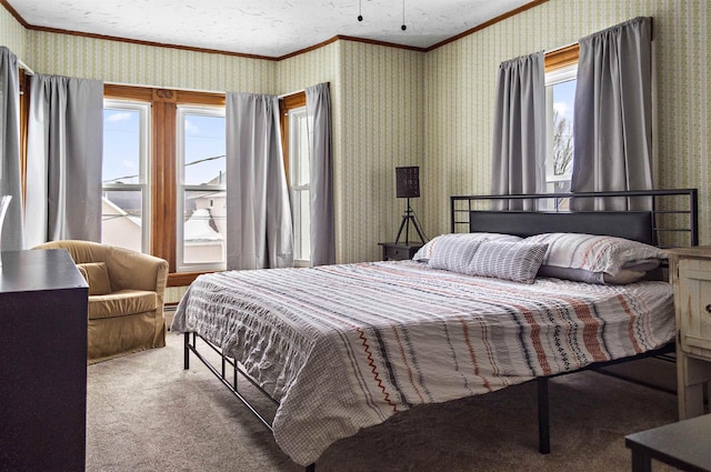 bedroom featuring wallpapered walls, a textured ceiling, carpet floors, and ornamental molding