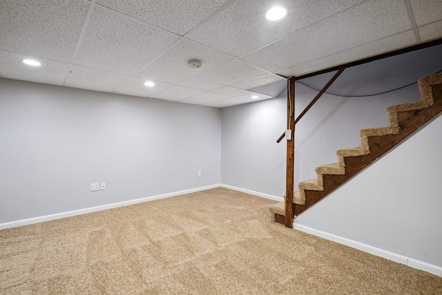 finished basement featuring carpet flooring, recessed lighting, stairway, and baseboards