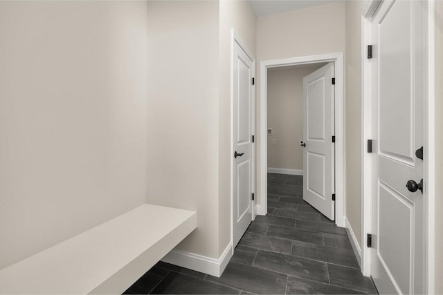 mudroom featuring baseboards