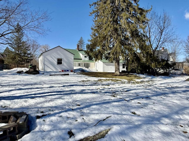 view of snow covered property