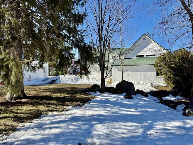 view of yard covered in snow