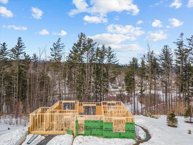 exterior space with a view of trees