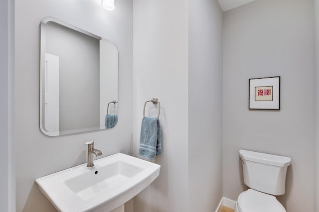 bathroom with a sink and toilet