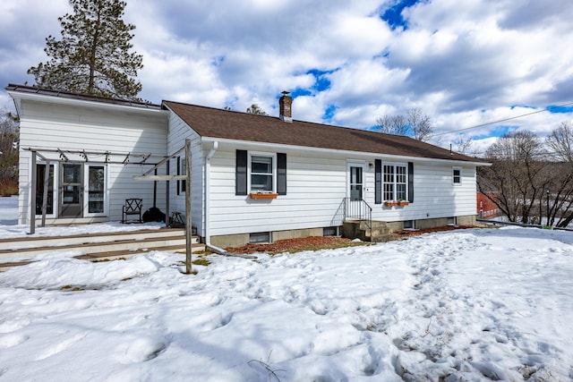 view of front of home with a chimney