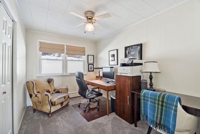 carpeted office space featuring ceiling fan, ornamental molding, and a baseboard radiator