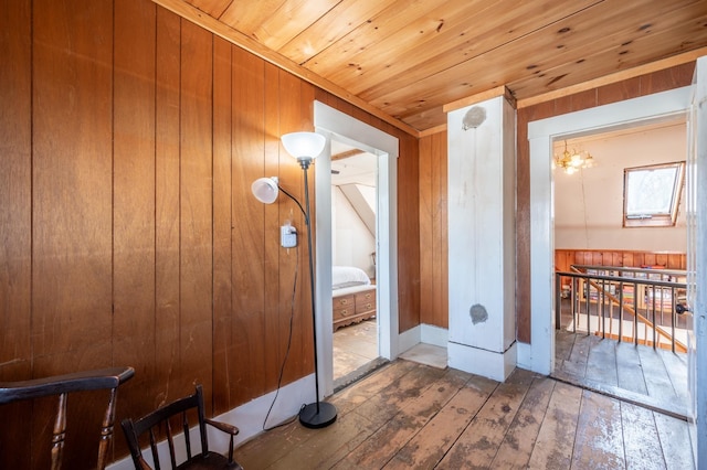 bathroom featuring wood-type flooring, wooden walls, and wood ceiling