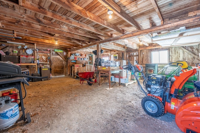 garage featuring a workshop area