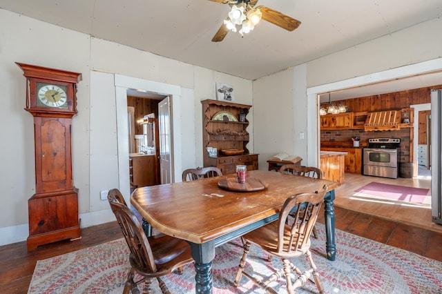 dining room featuring a ceiling fan and light wood-type flooring