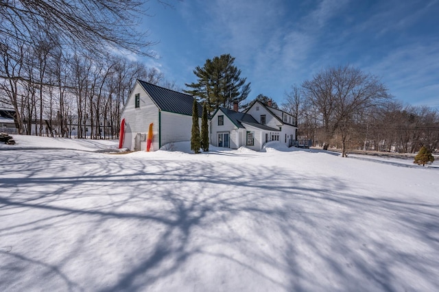 view of snow covered property