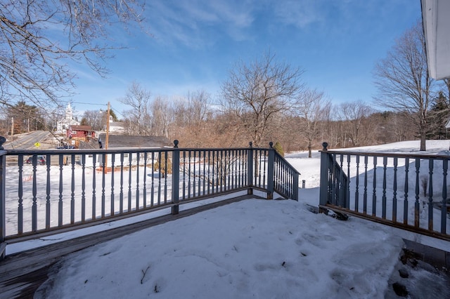 view of snow covered deck