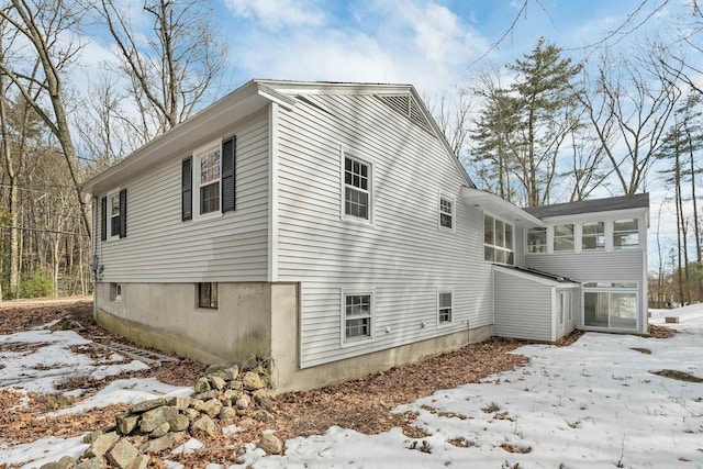 view of snow covered property