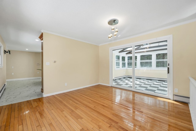 empty room featuring light wood-type flooring, baseboards, baseboard heating, and crown molding