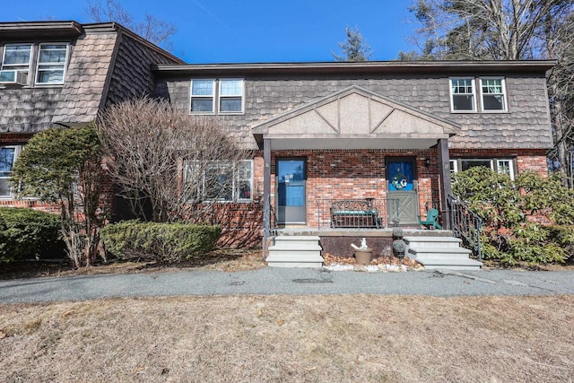 view of front of house with brick siding