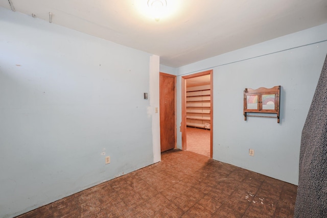 spare room featuring tile patterned floors