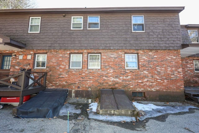 view of home's exterior featuring brick siding