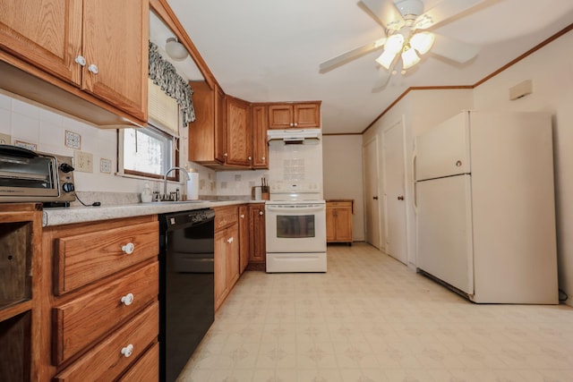 kitchen with brown cabinets, under cabinet range hood, white appliances, light countertops, and light floors