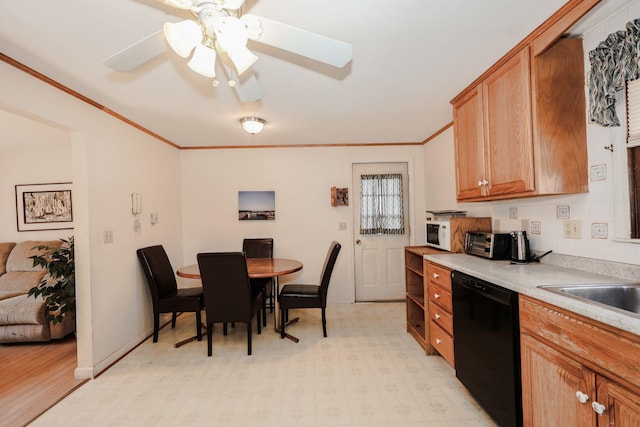 kitchen featuring light floors, light countertops, dishwasher, crown molding, and brown cabinets