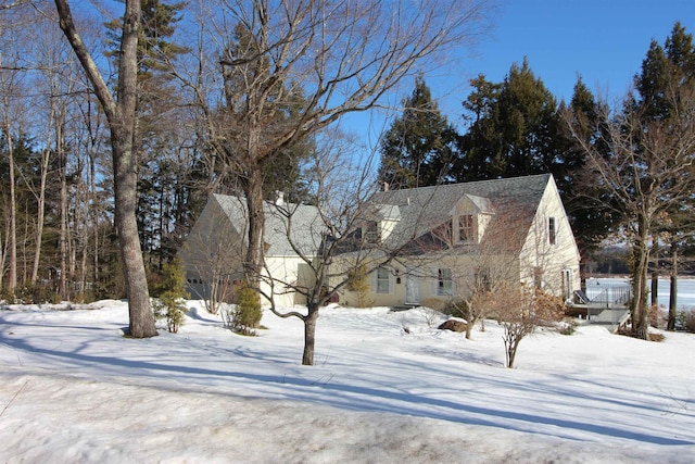 view of snow covered property