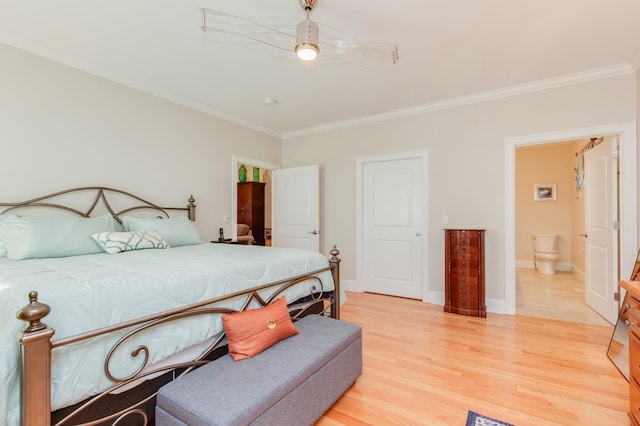 bedroom featuring a ceiling fan, crown molding, light wood-style floors, and baseboards