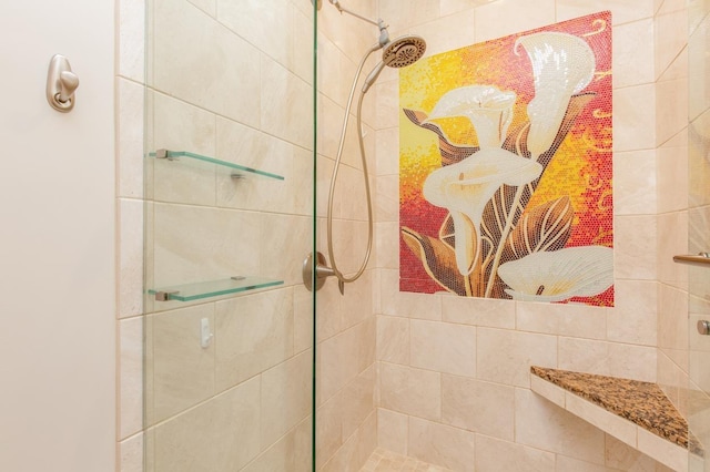 bathroom featuring tiled shower