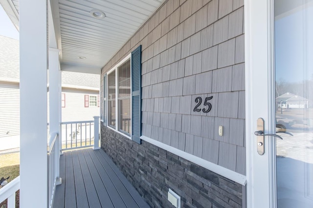 deck featuring covered porch