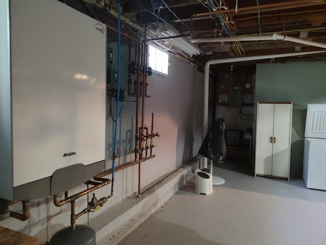 below grade area with fridge and water heater