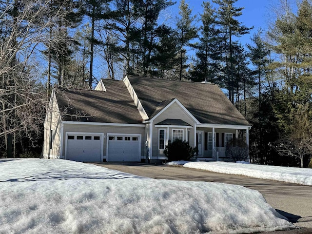 view of front of home featuring an attached garage and driveway