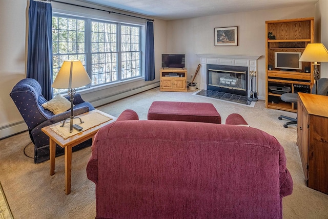 living area with a fireplace with flush hearth, baseboard heating, and carpet floors