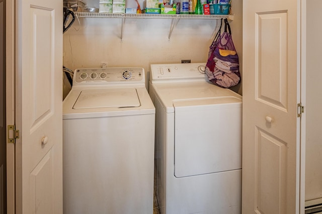 laundry room with laundry area and washer and clothes dryer