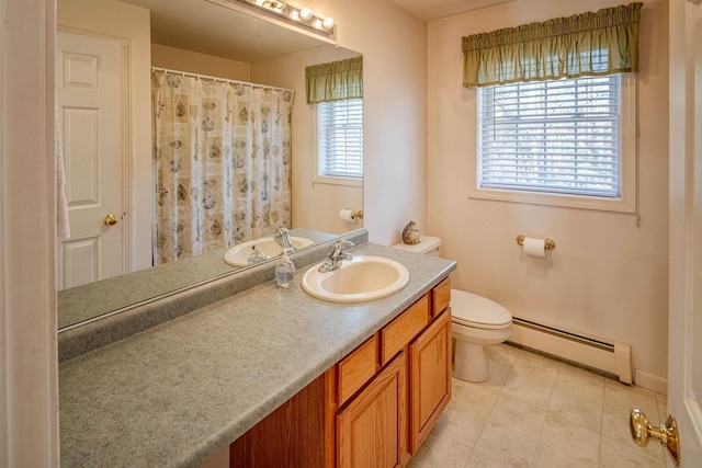 full bathroom featuring toilet, tile patterned flooring, baseboards, baseboard heating, and vanity