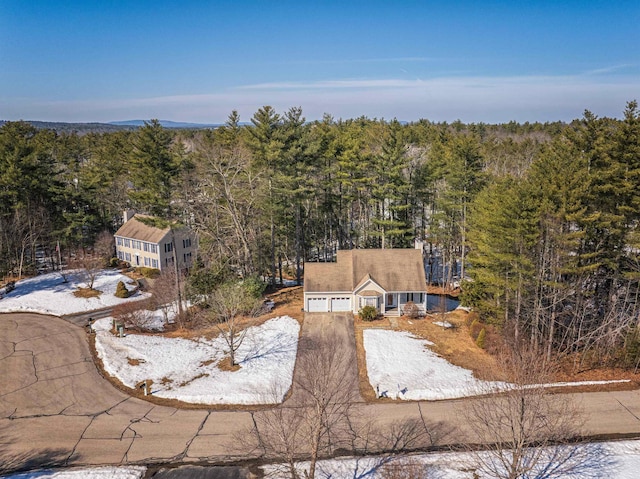 aerial view with a wooded view