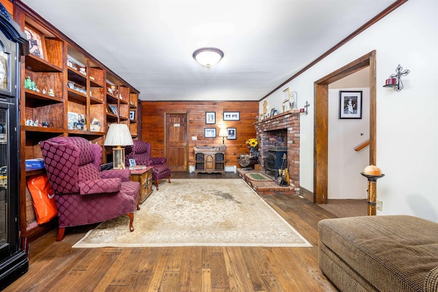 living room featuring hardwood / wood-style floors and wooden walls