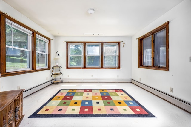 playroom featuring baseboard heating