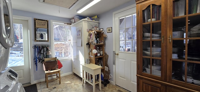 interior space featuring plenty of natural light and baseboards