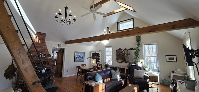 living room featuring plenty of natural light, hardwood / wood-style floors, and a ceiling fan