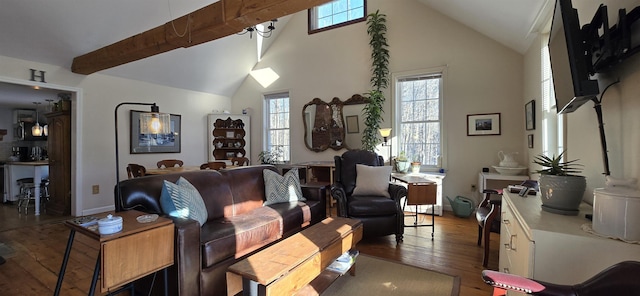 living area featuring hardwood / wood-style flooring, high vaulted ceiling, baseboards, and beam ceiling