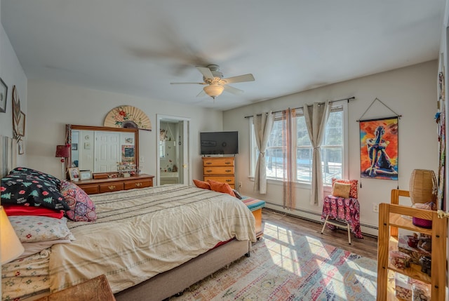 bedroom featuring wood finished floors and a ceiling fan