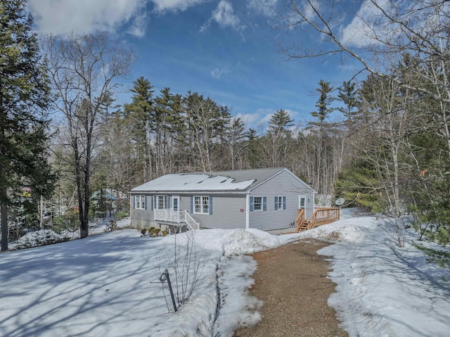 view of front of property featuring a deck