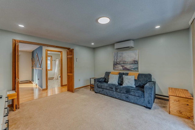 living area with a baseboard heating unit, baseboards, carpet, an AC wall unit, and recessed lighting