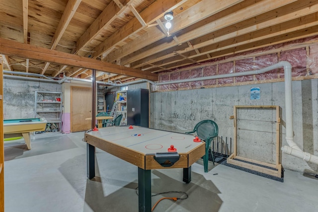 game room with concrete floors and billiards